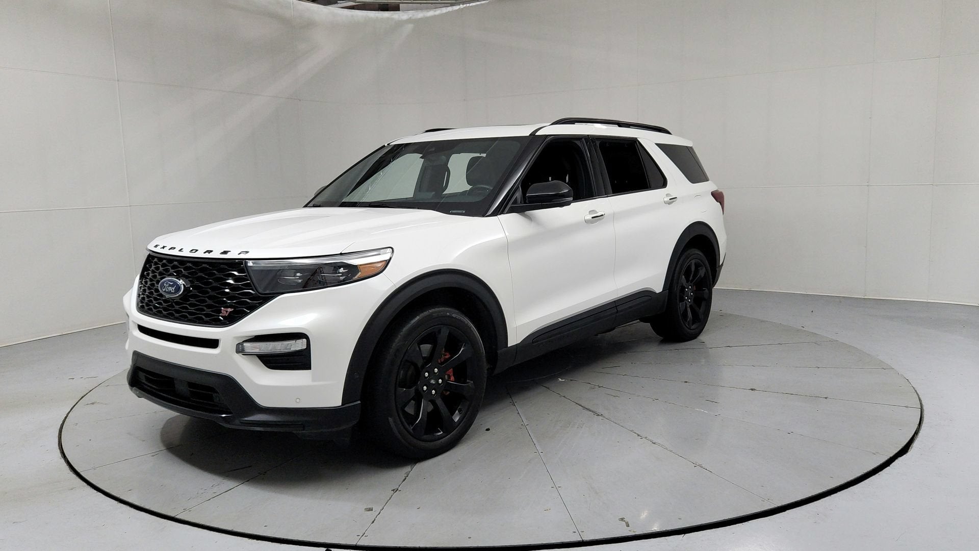 2021 Ford Explorer ST in White — front three-quarter view